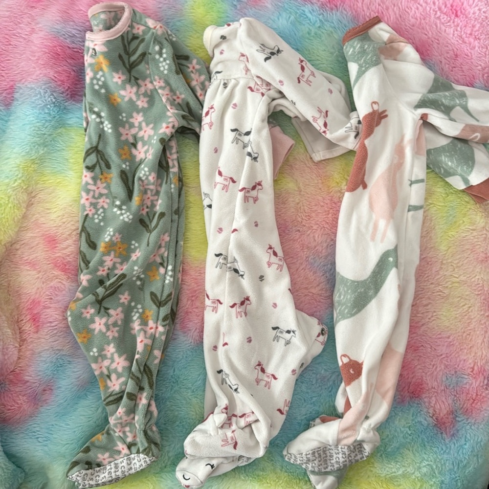 THREE footie pjs from carters